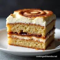 The Ultimate Gooey Cinnamon Roll Cake with Cream Cheese Frosting