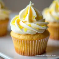 The Ultimate Moist Lemon Cupcakes with Tart Buttercream